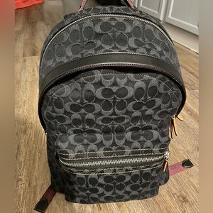 Coach black denim backpack